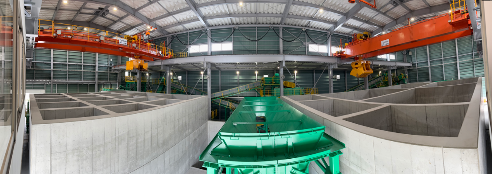 New equipment including a heavy-duty shredder, powder silo, and pit for high-moisture materials